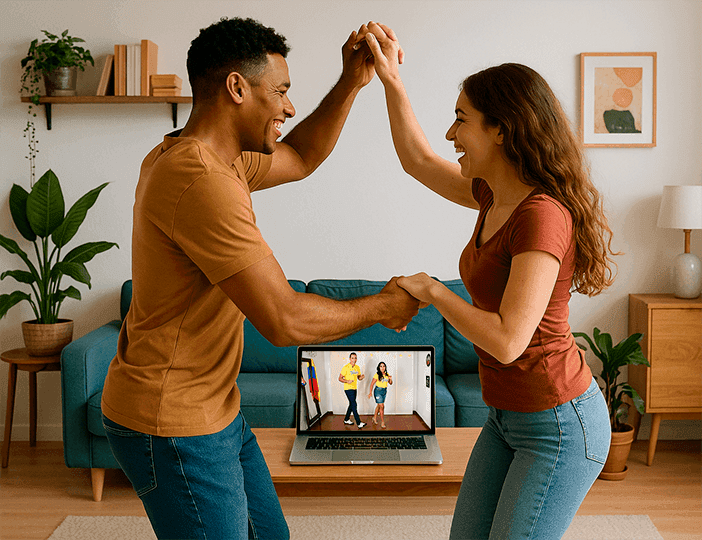 Pareja bailando con portátil